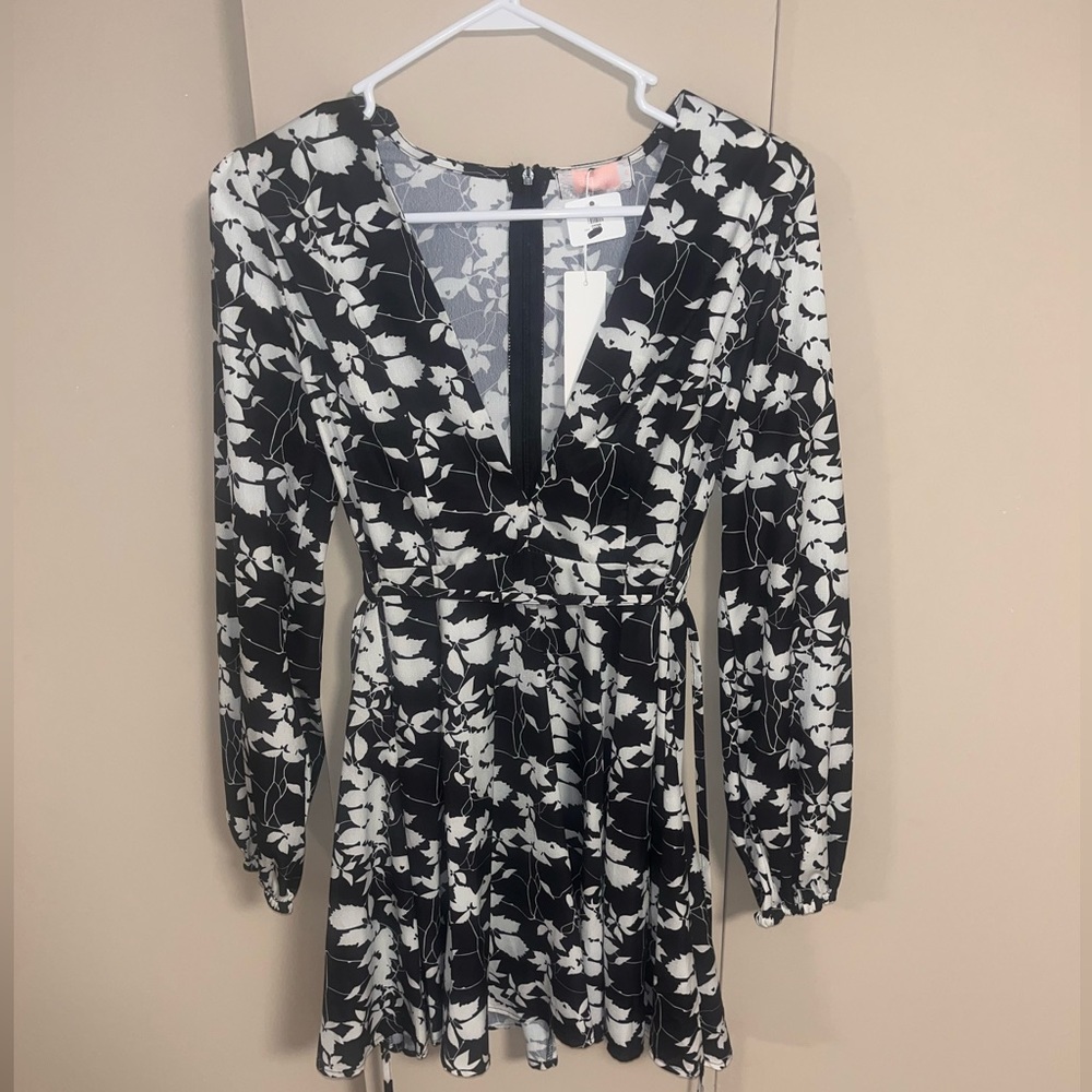 Black long sleeve dress with white flowers from Apricot Lane. New with tags